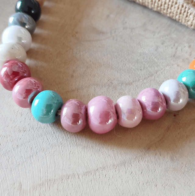 Bracelet Réglable en axier inoxydable et sa perle en ceramique